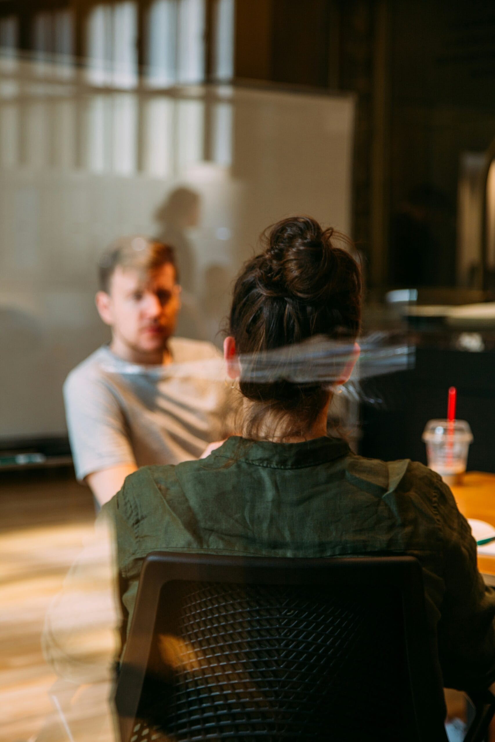 Person struggling with brain fog in meeting